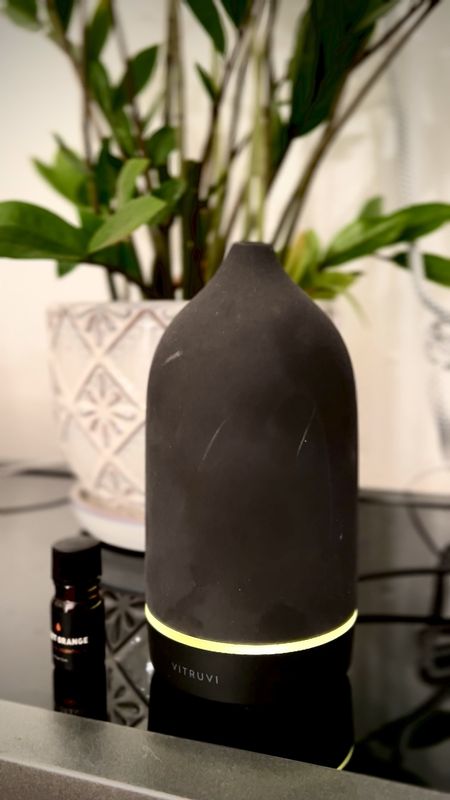 I use my Vitruvi Ceramic Essential Oil Diffuser to set the tone for my day. Today I'm in work mode so I've chosen sweet orange oil for focus and energy. 

#LTKVideo #LTKfindsunder100 #LTKhome