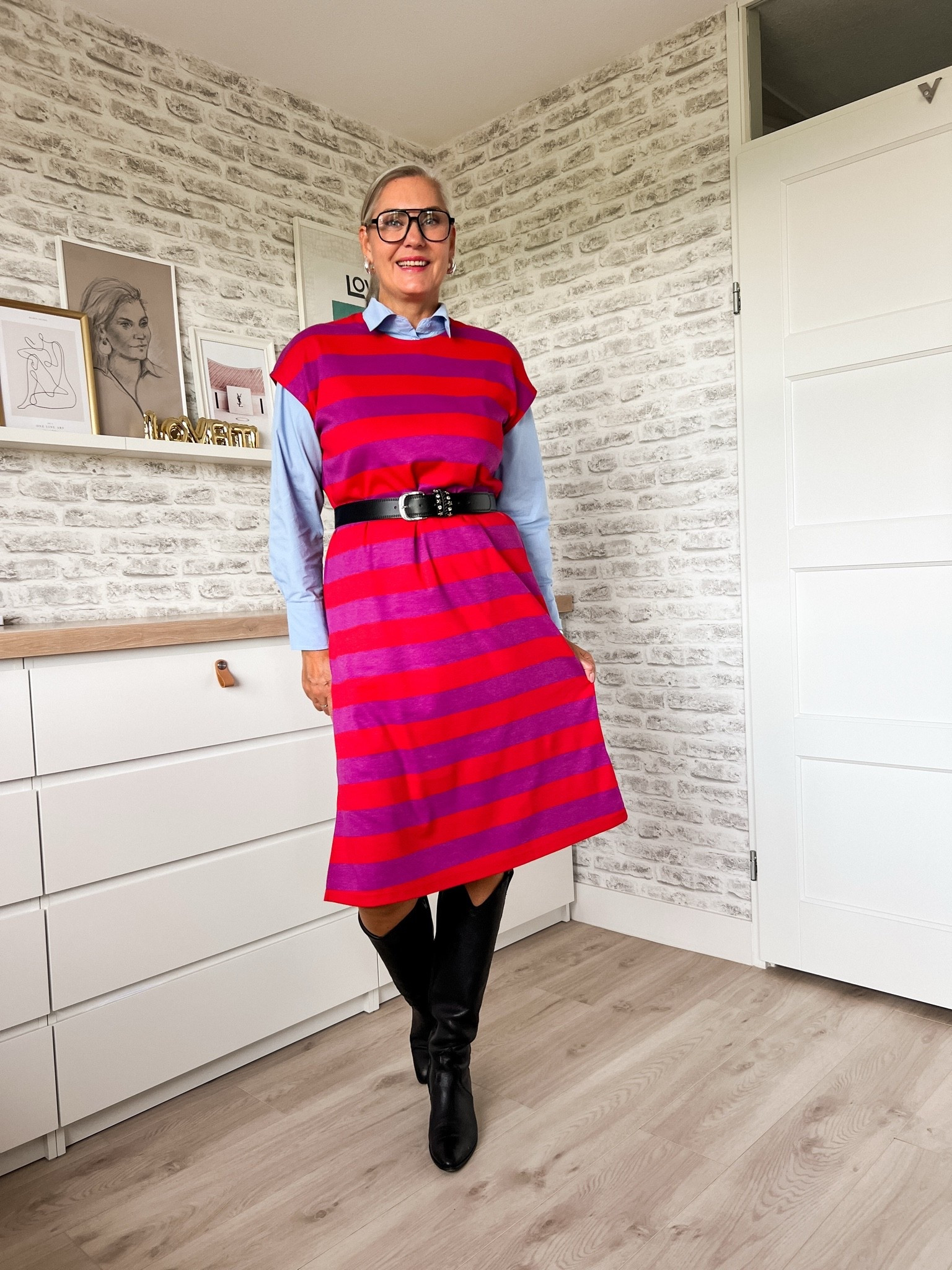 Back to work look. Rood met paars gestreepte jurk (40/42) met daaronder een lichtblauwe katoenen blouse (42), zwarte riem met Strass.

#LTKFashionMonth #LTKnederlands #LTKeurope