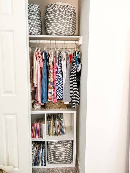 The key to organizing kids closets is to create spaces to store items. Cube storage units fit perfectly under hanging kid clothes and are perfect for storing toys, books and blankets. 

#LTKfindsunder100 #LTKhome #LTKfamily