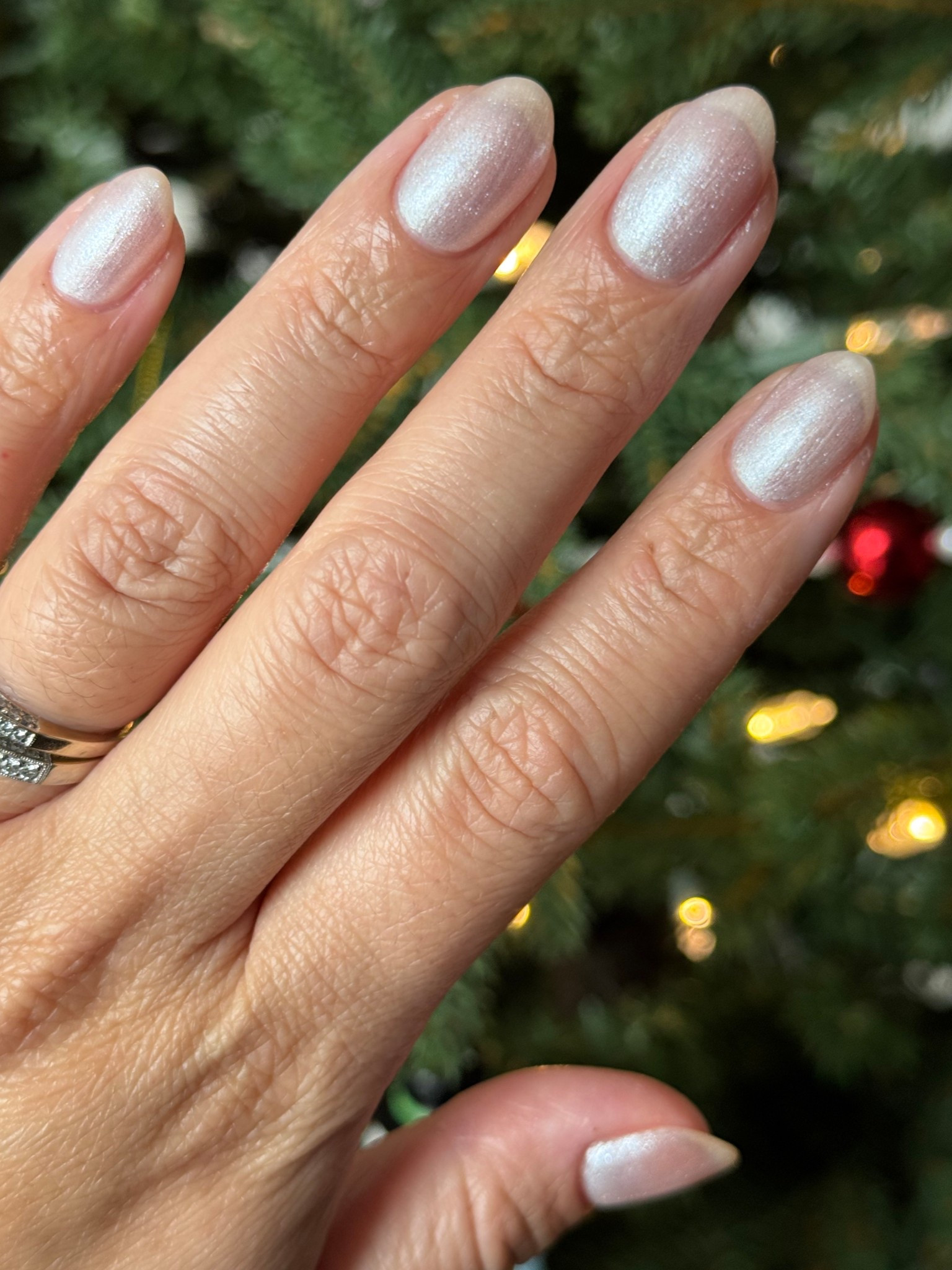 Pearlescent mani with an added shimmery layer! 

2 coats Freshwater, 1 coat Midnight Disco

Midnight Disco is one of my favorite polishes ever! It adds a velvety glitter effect to regular polish. 

#LTKBeauty