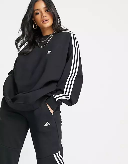 adidas Originals adicolour three stripe sweatshirt in black | ASOS (Global)