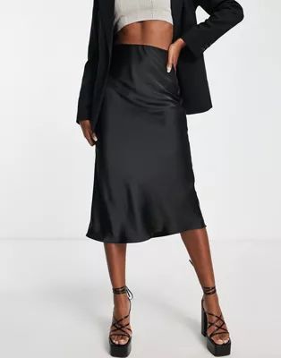 ASOS DESIGN satin bias midi skirt in black | ASOS (Global)