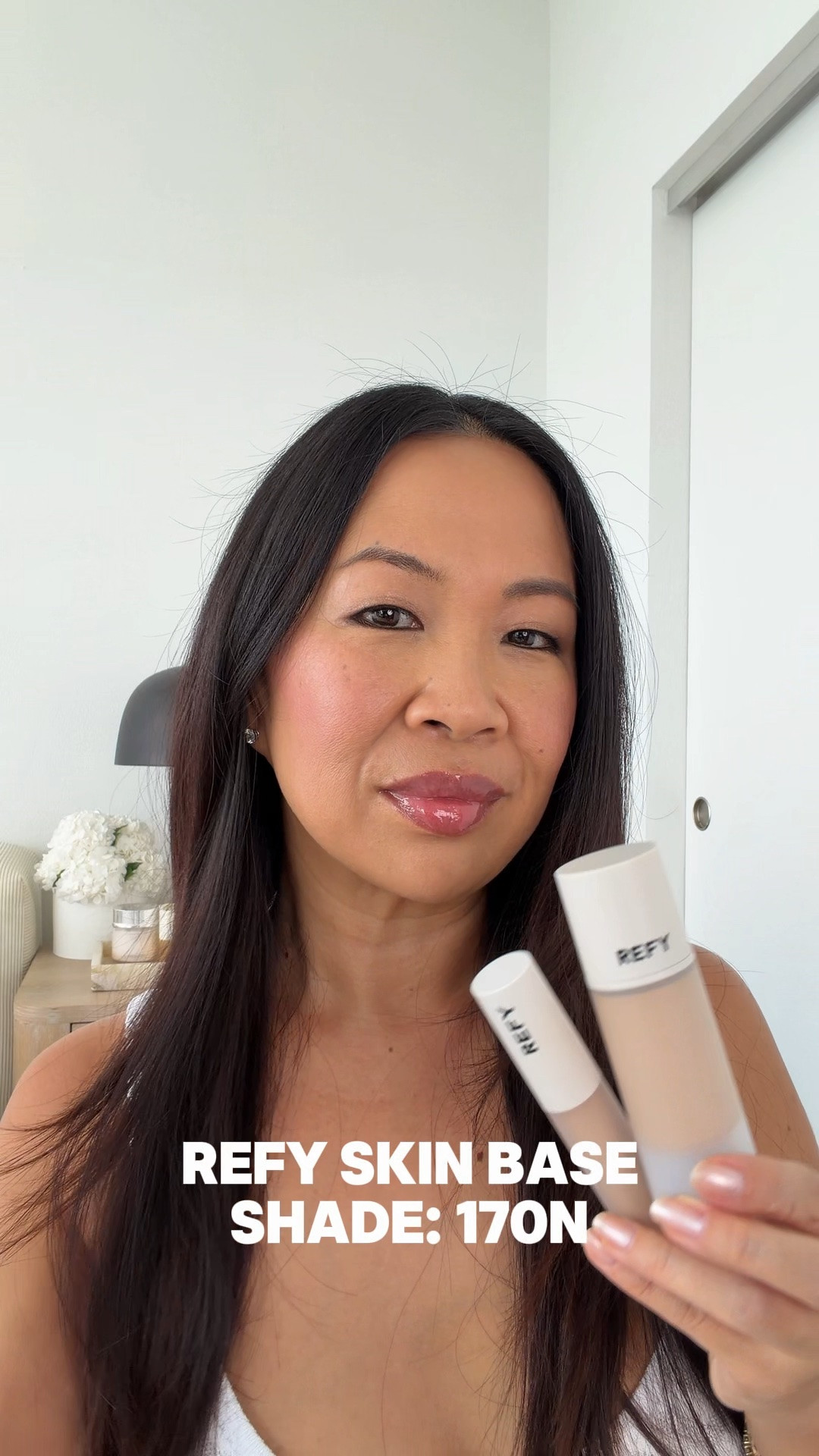 Try on the @refybeauty Skin Base Gel Skin Tint with me! Matched myself to shade 170N at @sephora and it's a perfect match.

Texture seems to be in between a gel and skin tint. It feels on the thick side straight from the pump but it blends out to a flawless naturally dewy finish with their Complexion Brush (almost melts into the skin). 

Flawless skin base prep combos:
REFY Glow and Sculpt Primer 
Brightening Concealer Shade 09
@hourglasscosmetics Veil Loose Powder in Medium 
@pradabeauty Touch Cream Blush in Dahlia 
Lip Gloss in Rosewood

I think this is perfect for summer! They have some new launches coming next month that I can't wait to share! (They're REALLY good!)