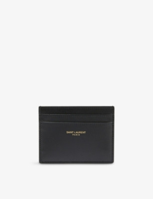 SAINT LAURENT - Logo-embossed leather cardholder | Selfridges.com | Selfridges