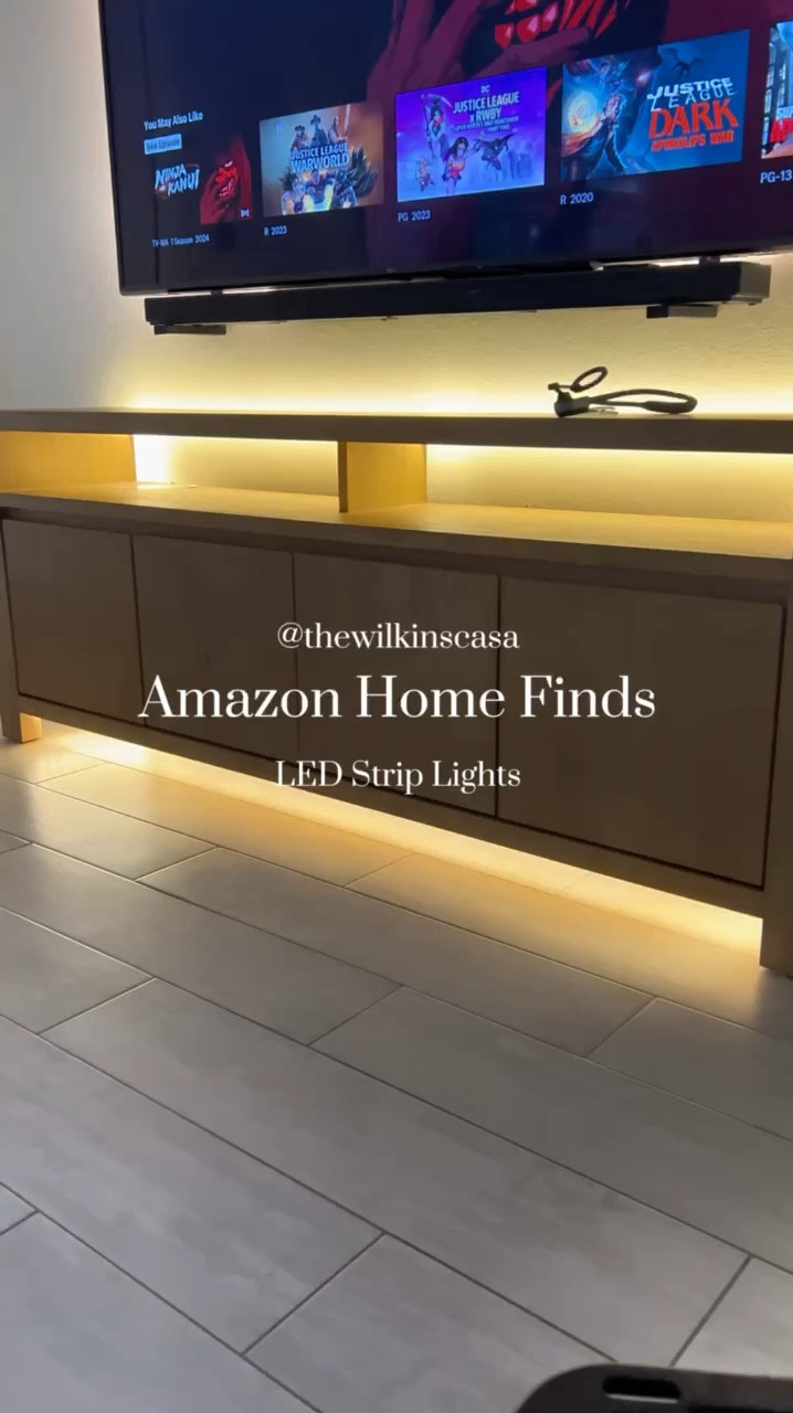 Amazon Home Finds ✨ Elevating our media console with LED Strip Lights. The perfect budget friendly way to elevate our space. #amazonhome #amazonfinds 

#LTKfindsunder50 #LTKhome