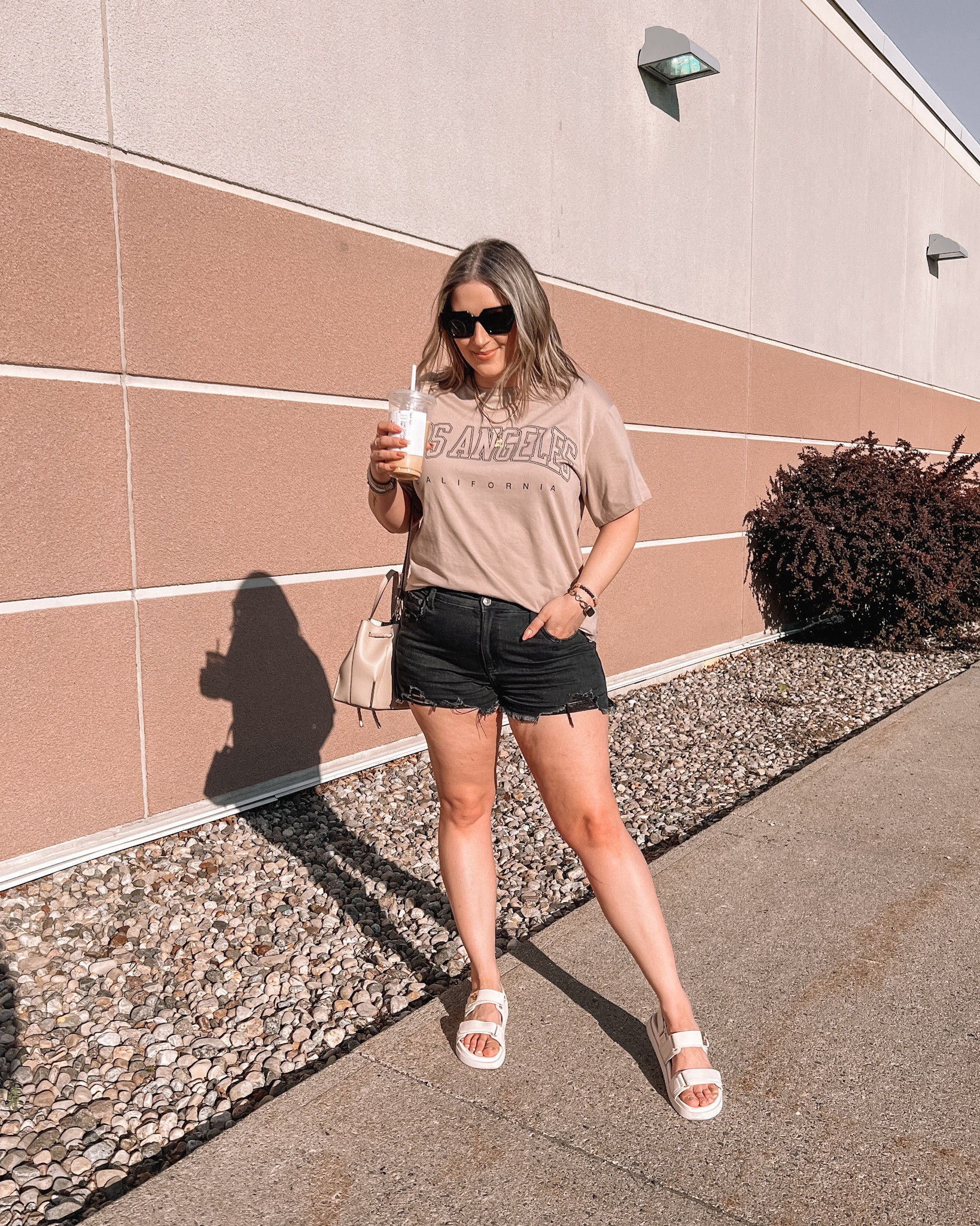 Neutral summer outfit - Amazon graphic tee (runs big, wearing S), the comfiest black denim shorts (on sale!! wearing L), Steve Madden chunky Velcro sandals (go up half a size)

Affordable fashion, summer ootd inspo


#LTKstyletip #LTKSeasonal #LTKsalealert