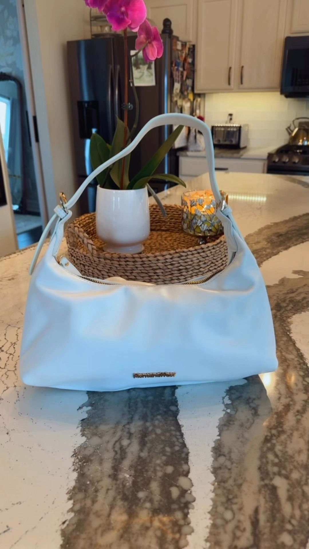 Your perfect summer designer-looking baguette purse is at Walmart for $15.99. It’s made of buttery soft vegan leather, small enough for date night, but large enough to hold all of your essentials. 🤍🤍🤍🤍🤍
#walmart #walmartfashion

#LTKFindsUnder50 #LTKStyleTip #LTKOver40