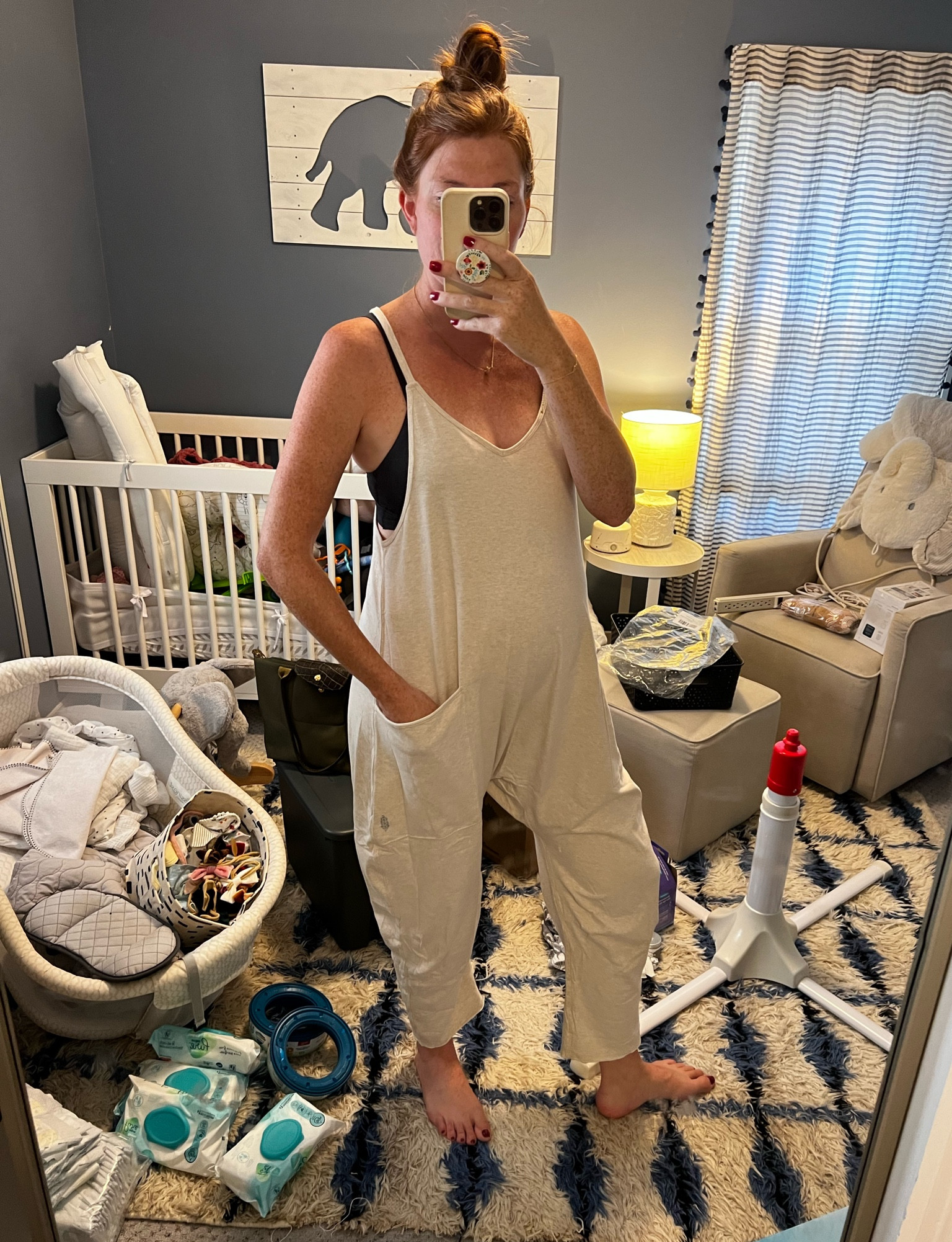 Reality: the nursery is a disaster, I’m uncomfortable in most clothes but this Free People Hot Shot onesie is amazing. I’m wearing a small in the oatmeal heather and it’s so comfy!