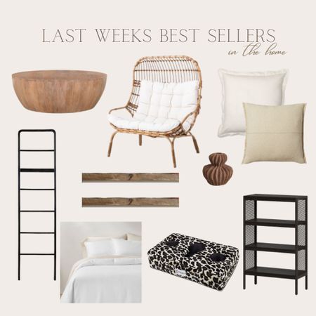 Last weeks home decor best sellers. Wooden drum coffee table, patio outdoor egg chair, throw pillows for the bed, black modern blanket ladder, floating wood shelves, candle holder, white linen comforter, neutral bedding, Amazon couch cup holder, black bookshelf 

#LTKunder50 #LTKhome