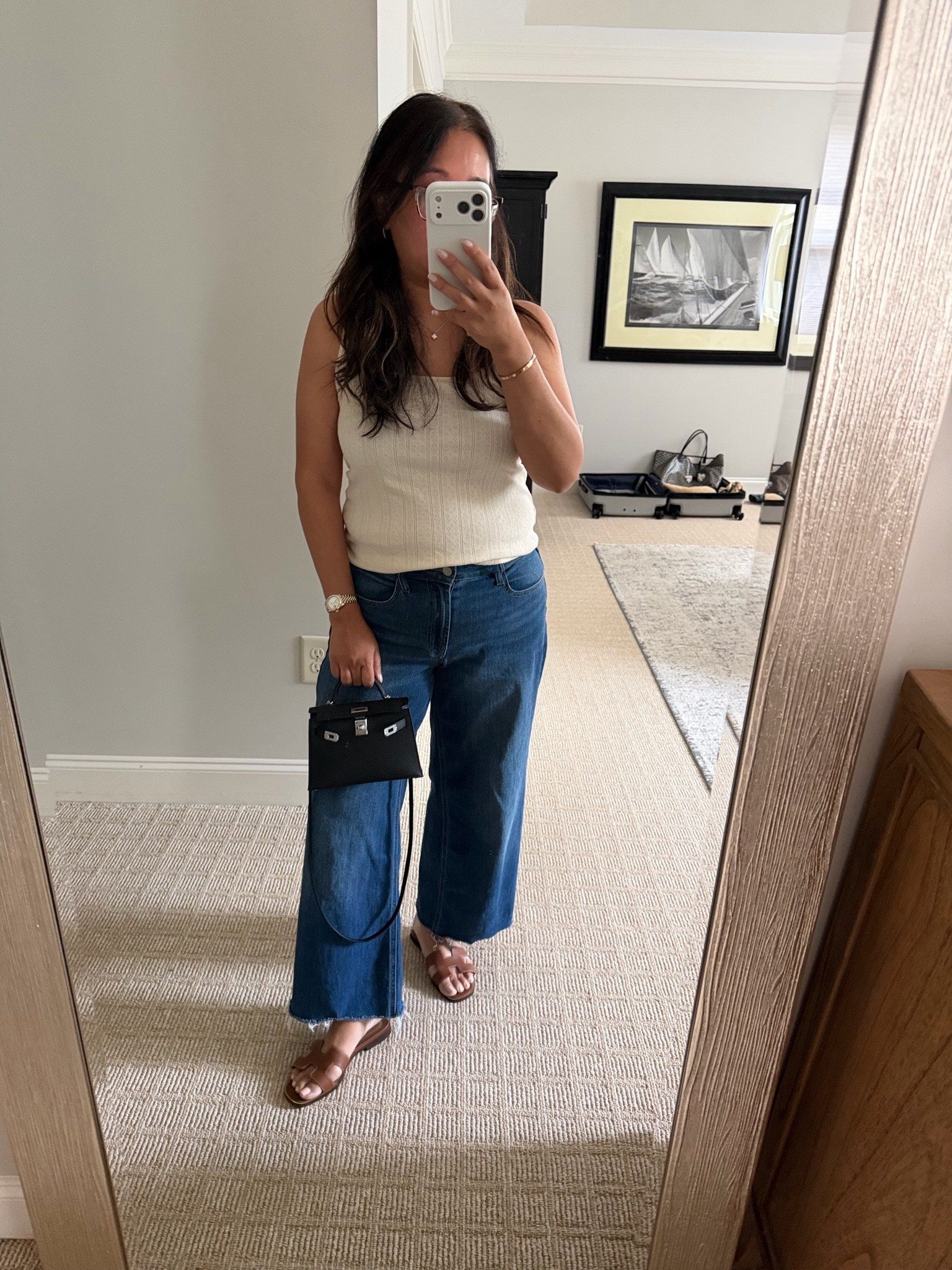 Outfit of the day! 
Cream pointelle tank -medium 
Midrise wide leg denim- size 8, I cut off the hems