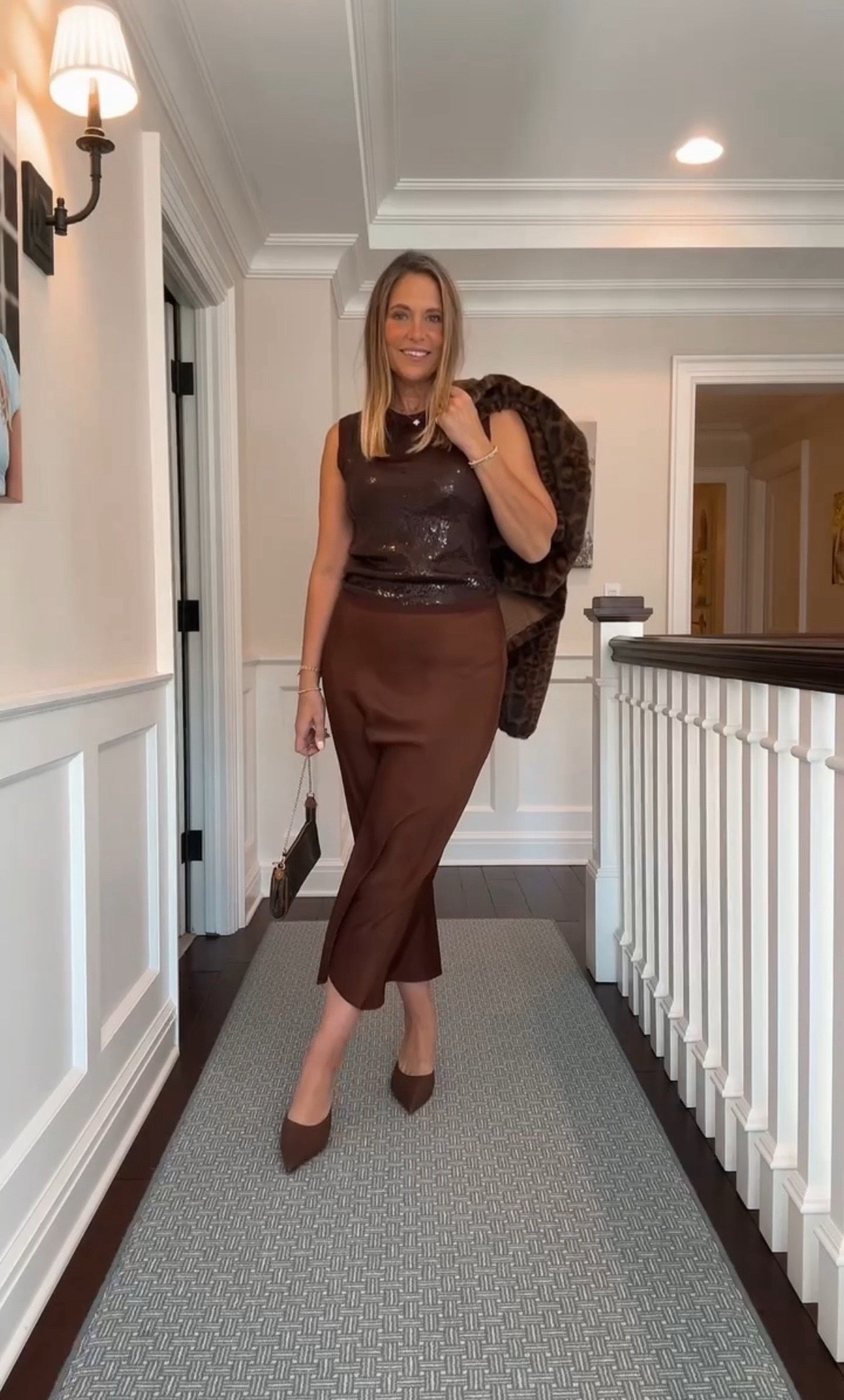 Here is some outfit inspiration for Thanksgiving! I am loving this brown midi skirt paired with the sequin top! I layered a jacket over top and paired it with brown heels to complete the look! 

#LTKOver40 #LTKStyleTip #LTKHoliday
