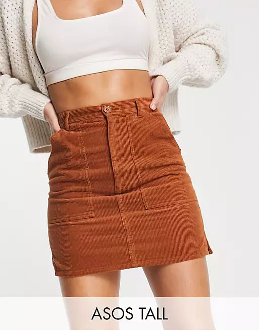 ASOS DESIGN Tall cord patch pocket mini skirt in rust | ASOS (Global)