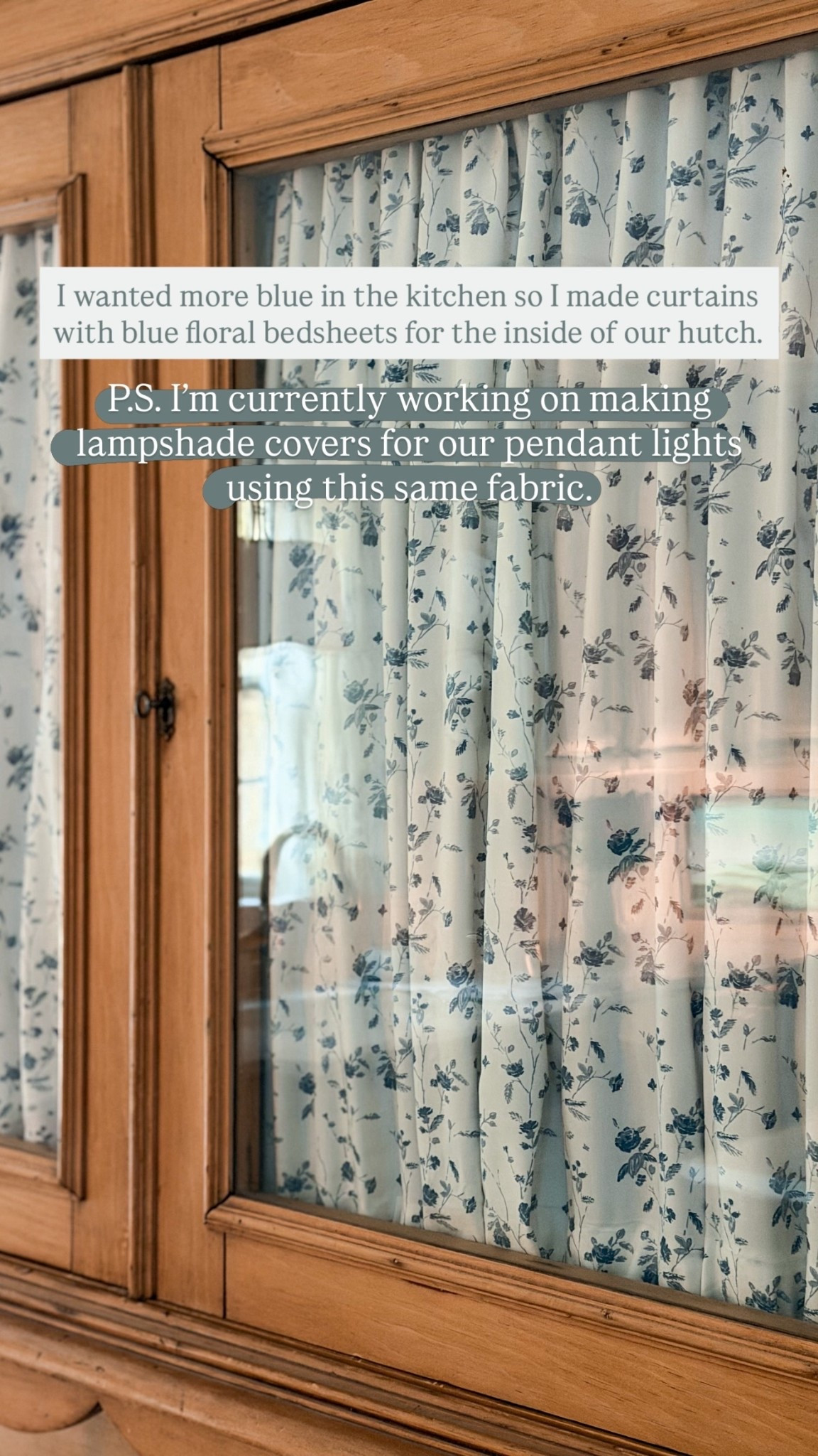 P.S. I’m currently working on making lampshade covers for our pendant lights using this same fabric. I wanted more blue in the kitchen so I made curtains with blue floral bedsheets for the inside of our hutch.
