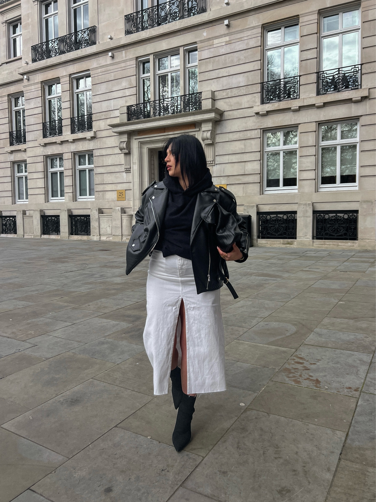 Never thought I’d be one to wear a denim midi skirt, especially if it’s white but here we go. Love how chic this outfit turned out. The perfect balance between smart and casual. And the contrast between black and white, masculine and feminine shapes, really makes the outfit interesting. I LOVE an oversized leather jacket in spring!

#LTKmidsize #LTKeurope #LTKstyletip