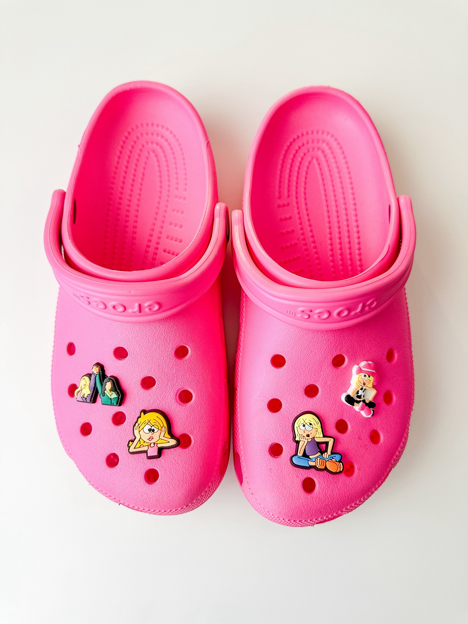 Call me an OUTFIT REPEATER because I’m about to be rockin’ these pink Lizzie crocs all day, every day!✌🏻🌸✨ I found this whole pack of croc charms for under $10! Linking in stories for my early 2000’s girlies💗

#LTKfindsunder50 #LTKMostLoved #LTKshoecrush