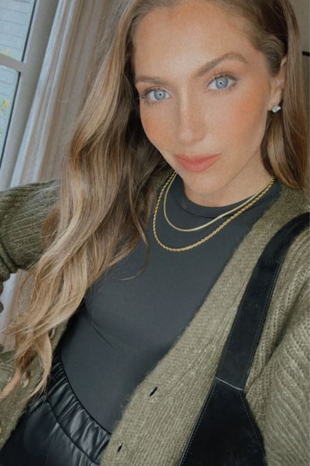 An easy go to date night casual yet sexy look. Leather jogger, bodysuit, cardigan, pumps, gold necklaces, vacation delicious perfume. Done  

#LTKHoliday #LTKGiftGuide #LTKSeasonal