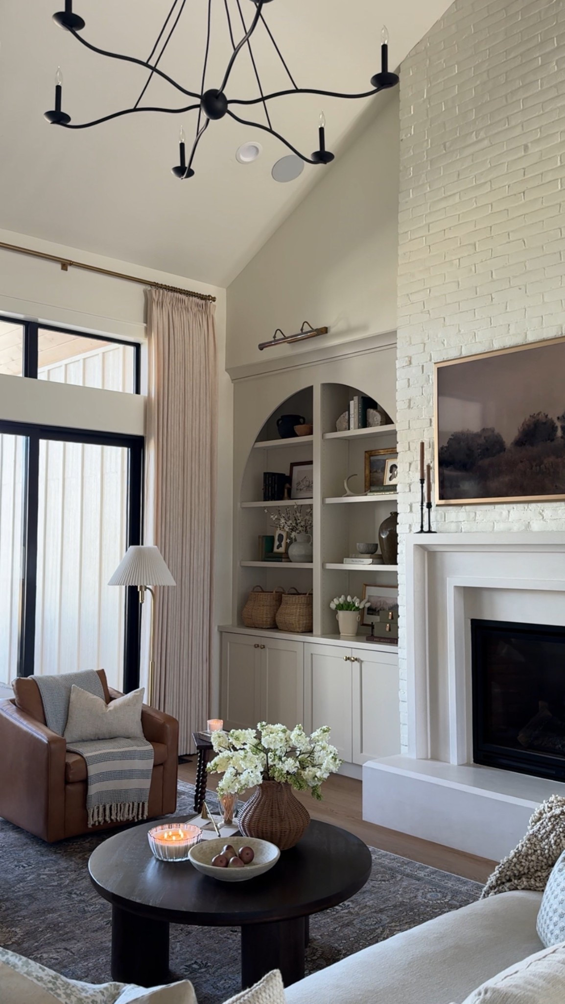 I love this little view in our living room! These beautiful new sand beige Two Pages curtains make such a difference in this space! Everything feels light and airy, yet still cozy, for the spring and summer which I love! 

Use code WHITEATHOME to save 15% always! 

#LTKHome #LTKSaleAlert #LTKStyleTip