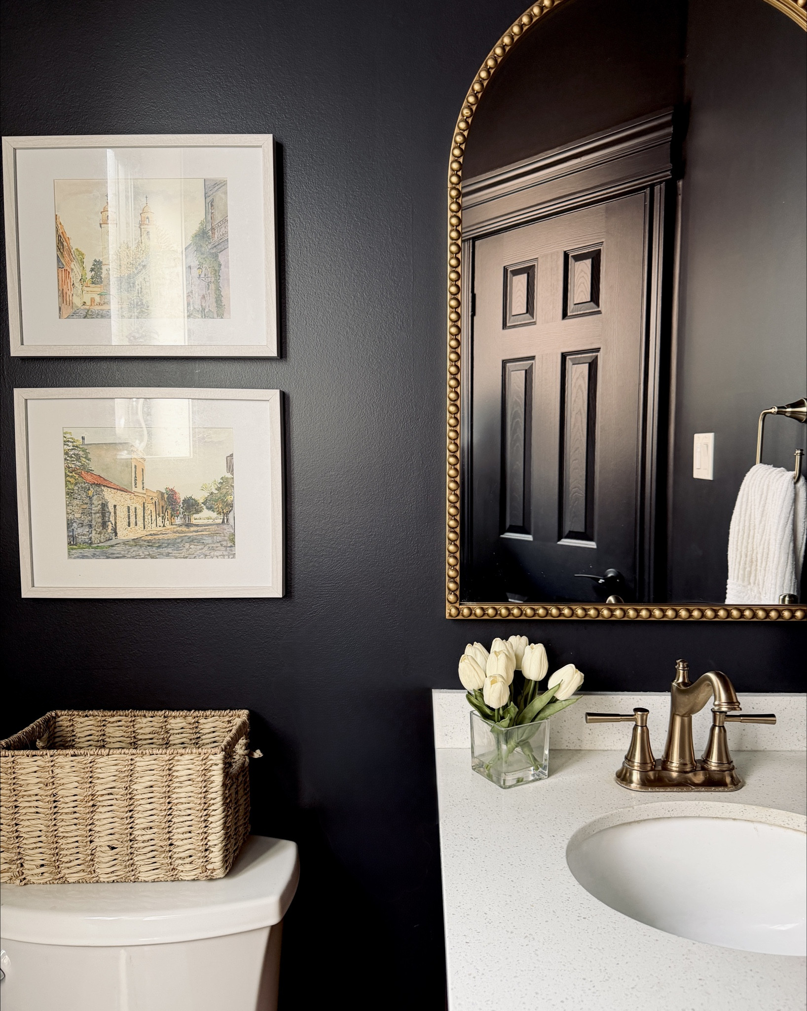 Powder room refresh 🖤

This little powder room was dated & builder-grade. We weren’t ready for a full gut, but with a few simple changes we were able to change the vibe completely!

The biggest transformation was colour drenching in  black - walls, ceiling, trim. It instantly made the space feel moodier, more custom, and surprisingly more elevated.

The champagne bronze finish on the hardware is the perfect warm shade to soften the look. A true gold or silver would’ve been too stark. 

All the decor & hardware details are from Amazon and linked here for you!.

Which detail is your favourite?

#moodypowderroom #bathroomrefresh #moderntraditional #blackpowderroom

#LTKcanada #LTKstyletip #LTKhome
