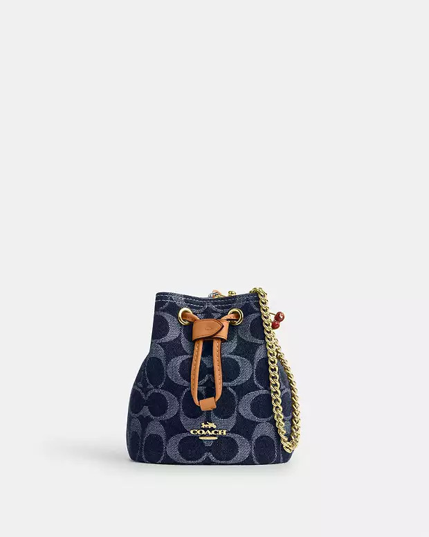 Drawstring Wristlet In Signature Denim | Coach Outlet US