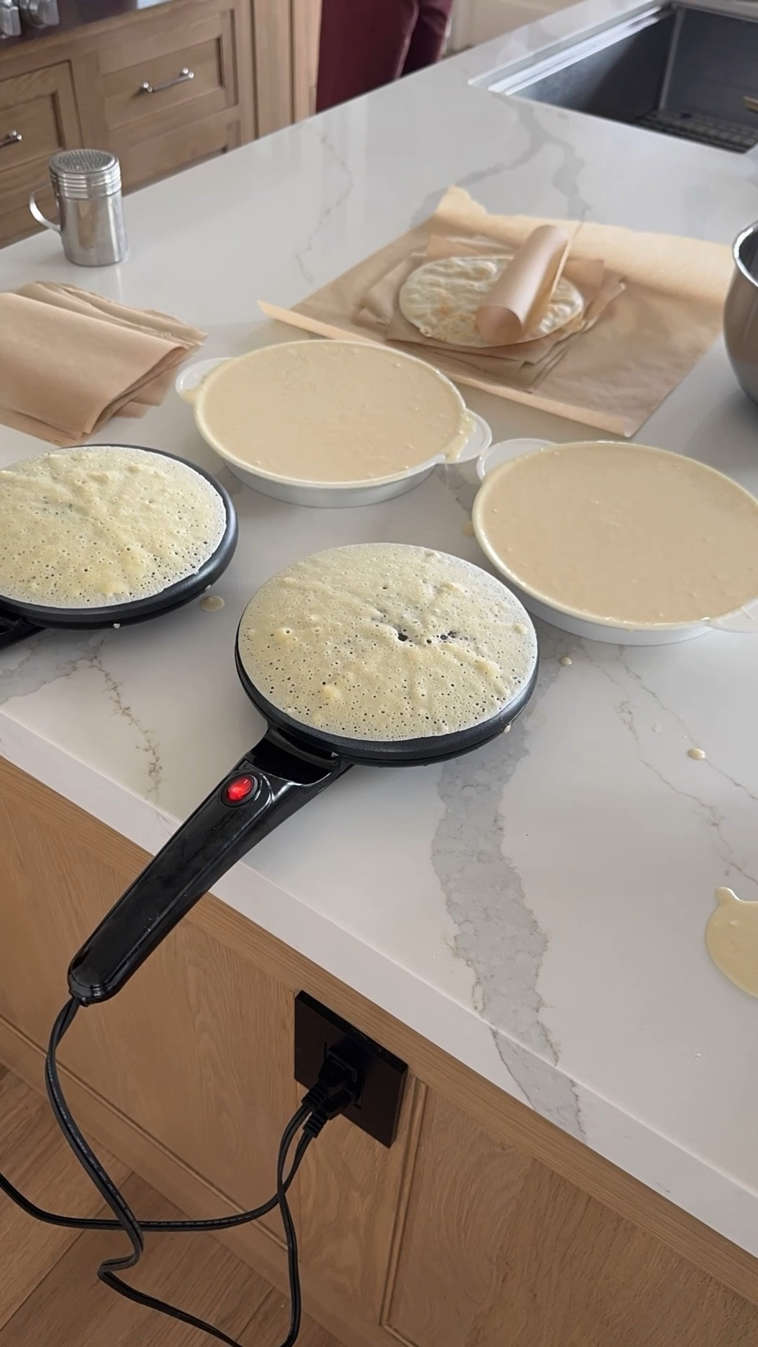 Every Sunday we make crepes!
They are so simple and easy. Before we start we season our heated cooker with a swipe of butter then take a paper towel and wipe off all the butter (this is key).
Here’s the recipe we quadruple:
1 cup flour
1/2 cup milk
1/2 cup water
1 tsp vanilla
1/2 tsp salt
1 egg.
We top ours most days with melted butter and white sugar and roll them up.