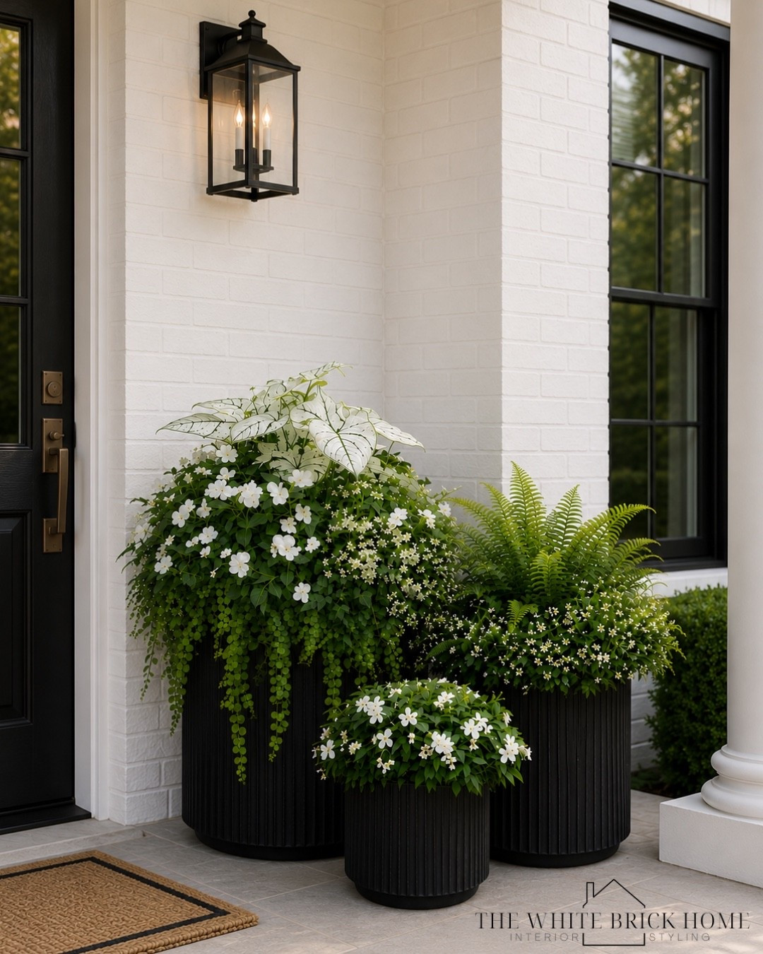 ✨ Three planters. One designer trick. ✨
If you want your front porch to look instantly more polished, try grouping planters in a set of three. Varying the heights creates dimension, fills empty corners beautifully, and gives that layered, high-end look without a lot of effort.
I styled this entry with a trio of black planters and simple greenery for a look that feels timeless, welcoming, and elevated. The best part? You don’t have to spend a fortune to achieve it.
I’ve rounded up some beautiful, affordable planter finds so you can recreate this look at home with ease. 🤍
Save this for your next porch refresh and let me know—are you team matching planters or mixed styles?
#FrontPorchIdeas #PlanterStyling #OutdoorDecor #CurbAppeal #ModernTraditionalHome #PorchDecor #OutdoorStyling #EntrywayInspiration #AffordableHomeDecor #AmazonHomeFinds #ExteriorDesign #TheWhiteBrickHome #HomeStyling #OutdoorLiving #PorchInspo

#LTKHome #LTKSeasonal #LTKSaleAlert