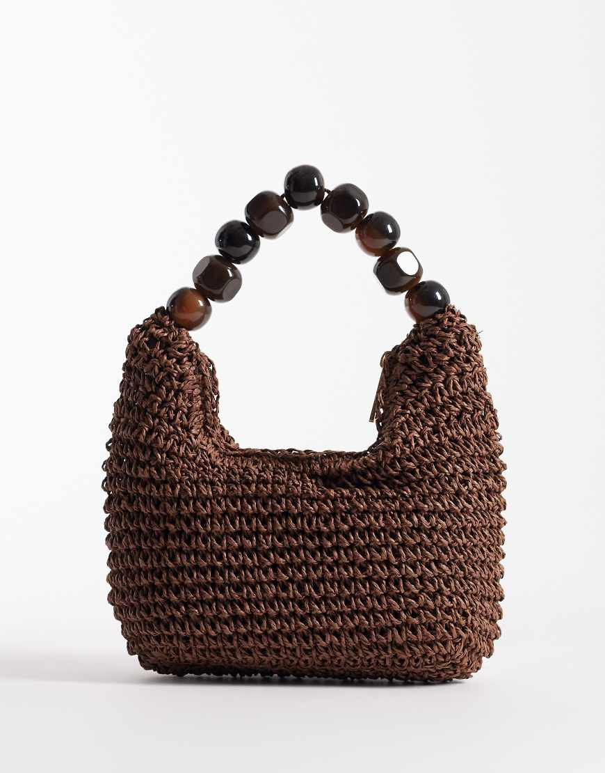 ASOS DESIGN – Stroh-Handtasche in Schokobraun mit Griff mit Kugeldetails aus Kunstharz-Brown | ASOS (Global)