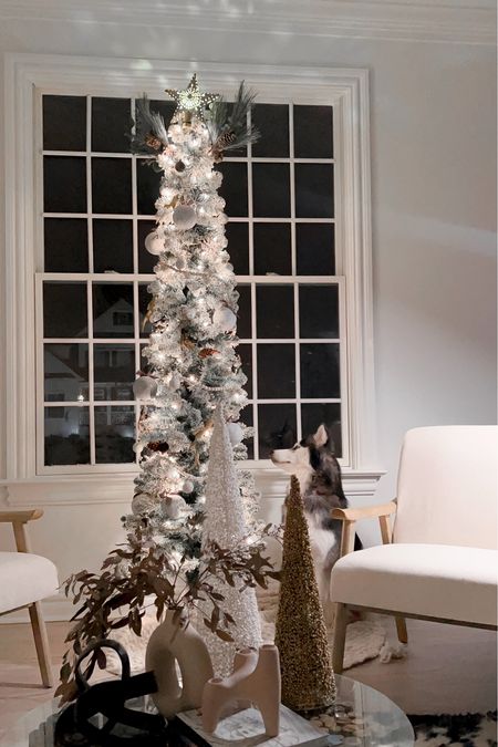Views of one of our pencil trees! Absolutely love our 7’ ft flocked christmas tree. It is a pencil tree or slim tree, comes in flocked, cashmere and standard tree looks. Tagging also all other details in This room to compliment a neutral Christmas decor  

#LTKfamily #LTKSeasonal #LTKHoliday