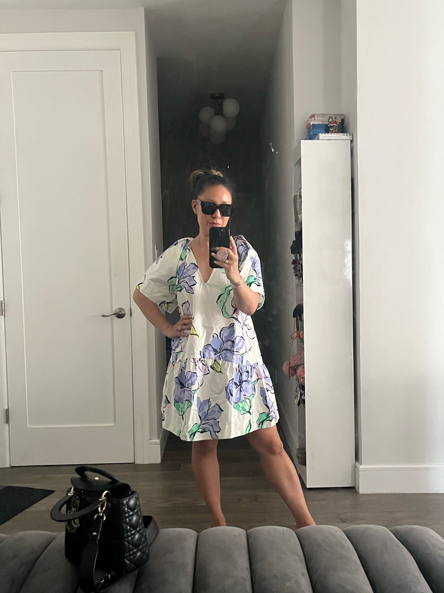 I’m skeptical about this floral dress.  Can you tell? But, I think it would work for someone who doesn’t wear black all the time. Haha. I’m wearing an xs. This is the same dress that I tried in black.

#LTKTravel #LTKShoeCrush #LTKFindsUnder50