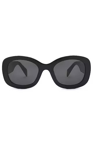 Prada Round Sunglasses in Black. | Revolve Clothing (Global)
