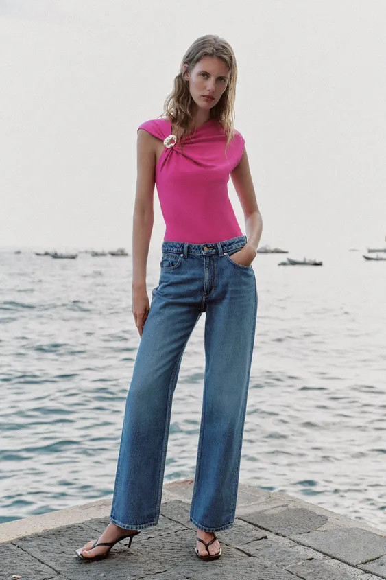 Asymmetric neckline top with sleeveless design. Featuring draped detail on the front with embosse... | Zara UK