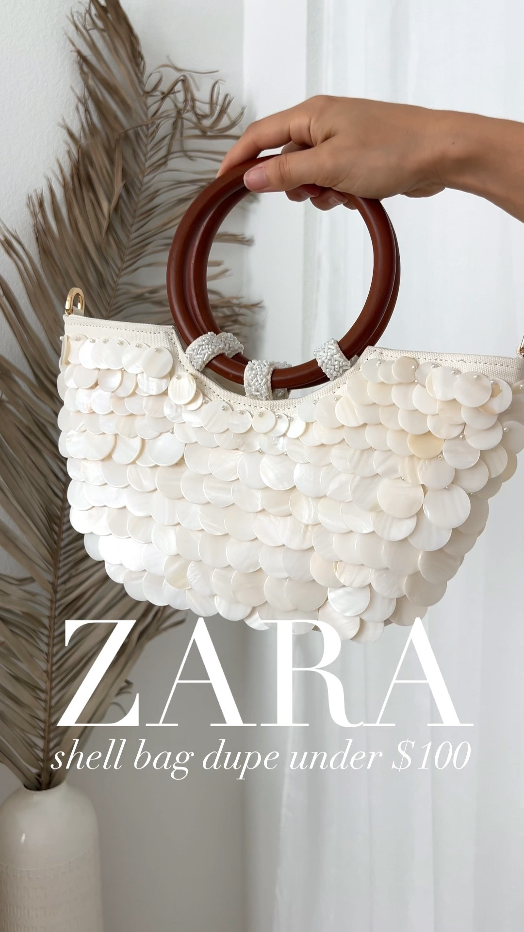 Zara shell bag look alike under $100! 🐚💭 My thoughts on this summer shell bag: I’m obsessed! The quality is AMAZING—way better than the viral Zara shell bag! The material is thick & heavy, the shell discs are perfect & well secured, the beaded details are beautiful, it features real wood handles, & the optional gold chain is chic touch! Shipping took a little while but it was 100% worth it. ⭐️⭐️⭐️⭐️⭐️ rating from me!

| Zara shell bag dupe, Zara dupe, Zara dupes, summer shell bag, summer bag, summer bags, summer bags 2025, trendy bags summer 2025, summer trends 2025, amazon bag, amazon summer finds, amazon summer must haves, amazon finds, amazon fashion finds 

#LTKSummerEdit