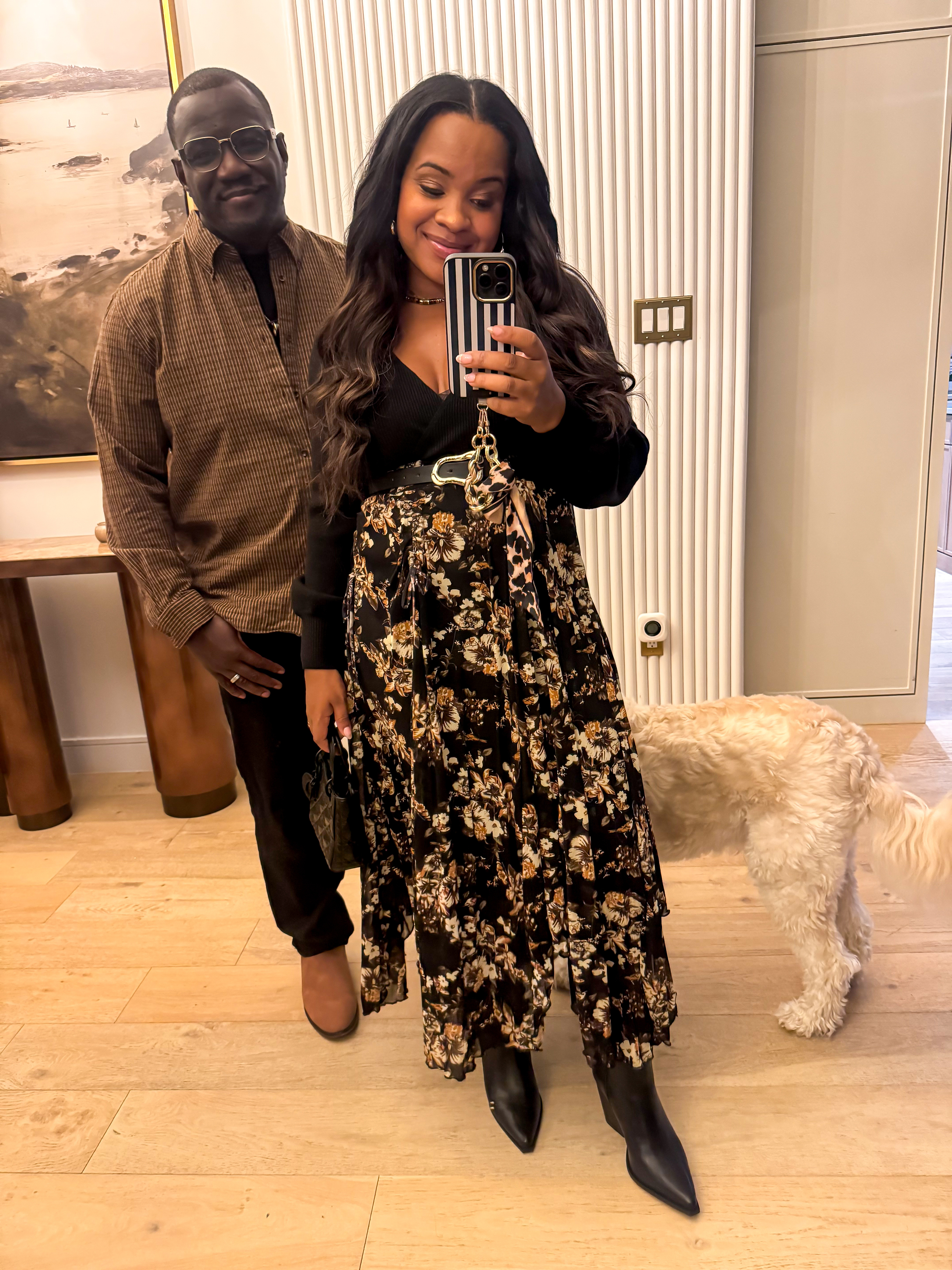 Loving this flowy VICI skirt paired with sleek black boots & ribbed sweater. 🤎✨ 

 #LTKootd #LTKStyleTip #LTKShoeCrush