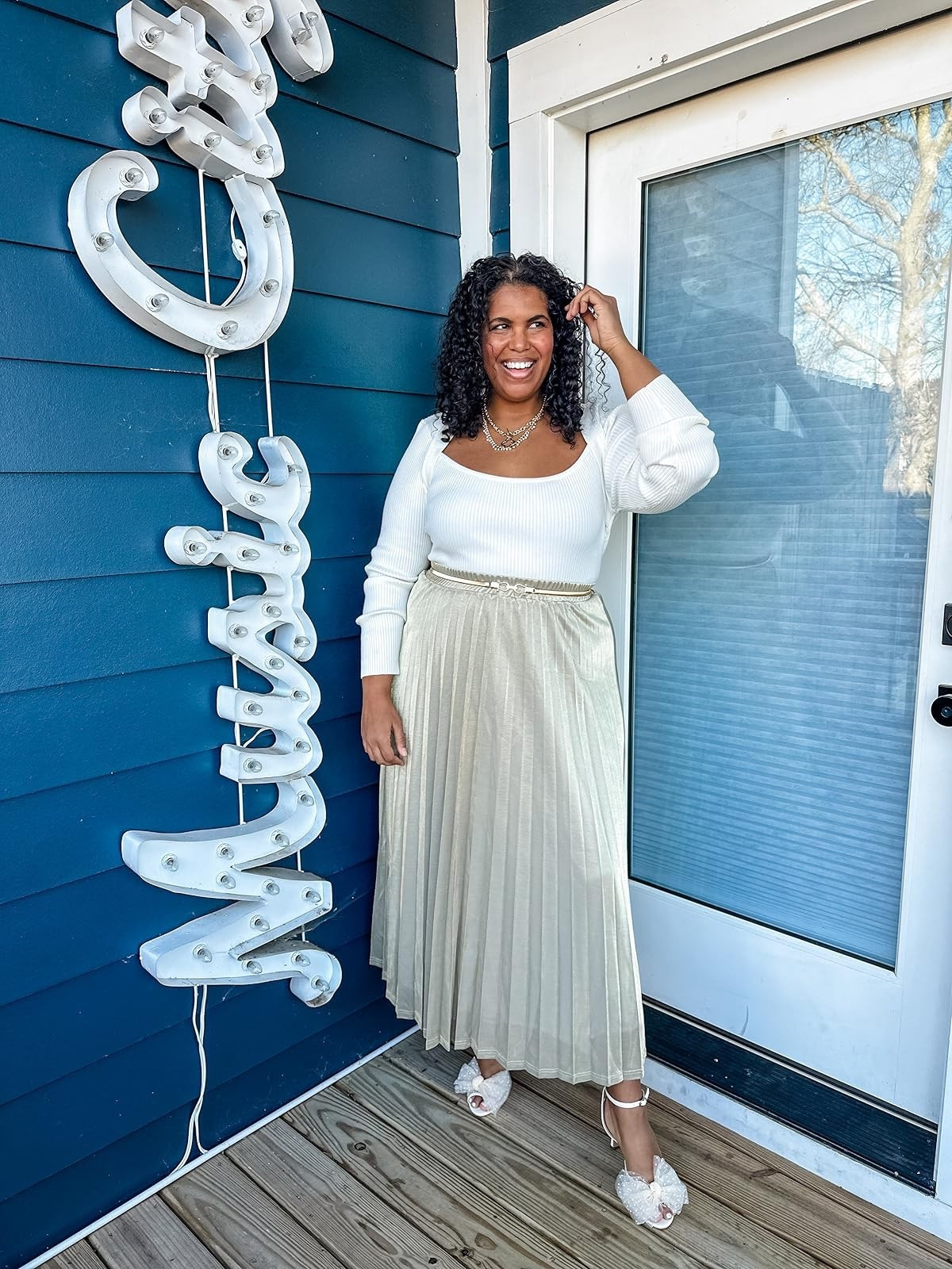 Love this shimmery skirt for the holidays. Perfect for my curvy gals! Im wearing size xxl in skirt and xl in sweater. Paired it with my fave bow heels. 

#LTKSeasonal #LTKHoliday #LTKootd