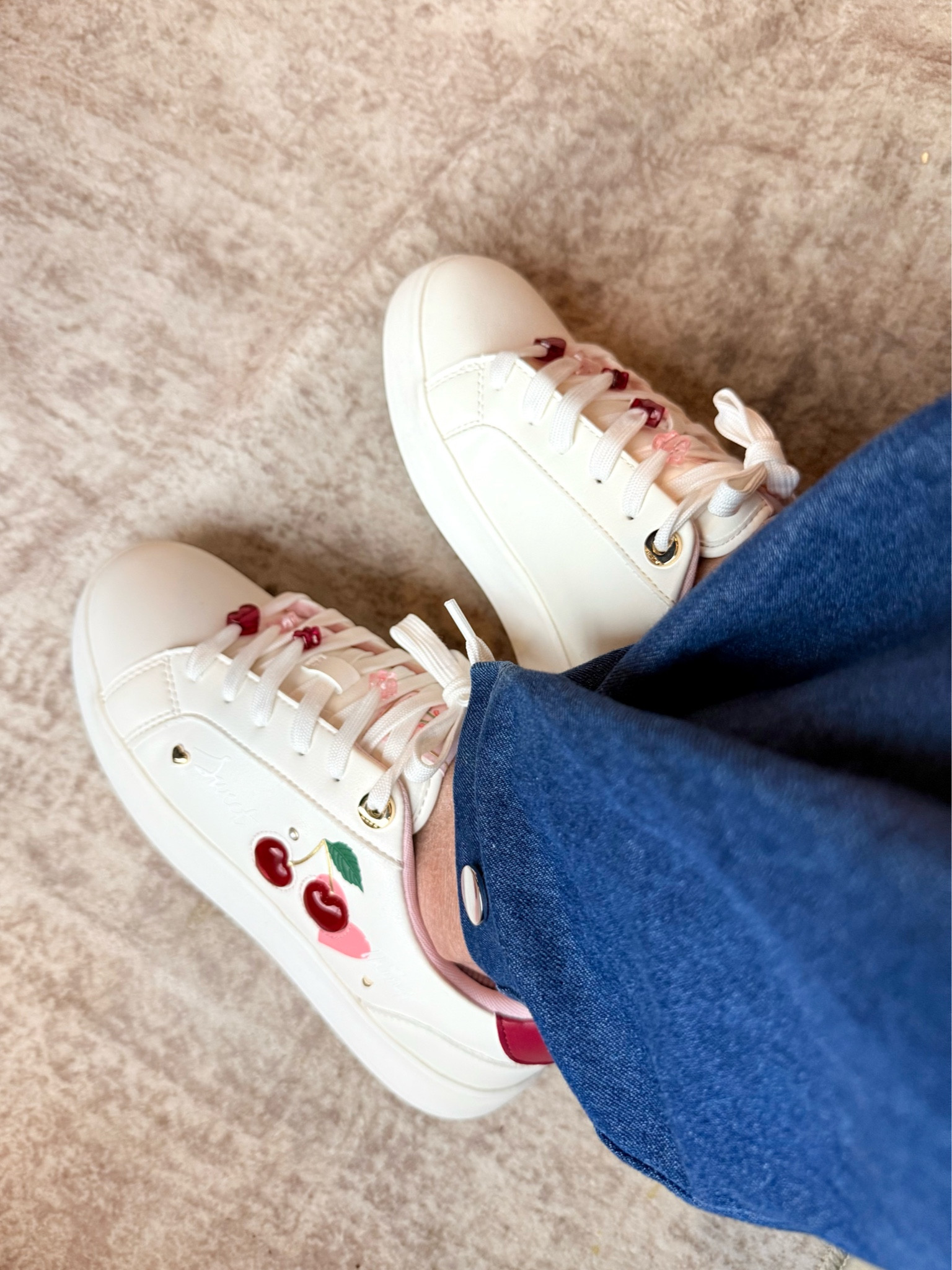 Super cute white sneakers with cherry detailing and charms on laces. 

#LTKshoecrush #LTKfindsunder100 #LTKsalealert