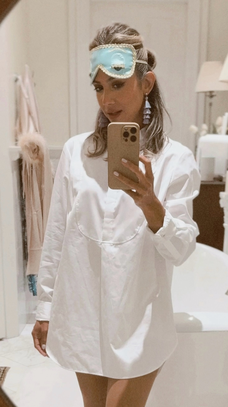 Instead of wasting money this year on a Halloween costume you’ll only wear once, why don’t you invest in an iconic, timeless look with pieces you’ll actually get good use out of?

This may be my easiest and most loved Halloween costume! I’d already thrifted the tuxedo shirt (you might remember this L.K. Bennett shirt from my Designer Label Thrifted Outfits post) and that is the actual sleep mask that I keep on my nightstand. The only thing I ordered was the purple tassel earrings I know I’ll re-wear in next spring/summer. The tricky part was how to wear this men’s shirt without a slip in modesty, but my sheer hose and boy shorts did the trick! I felt confident and secure, and had a great time without anything showing. 

#LTKOver40 #LTKHalloween #LTKSeasonal