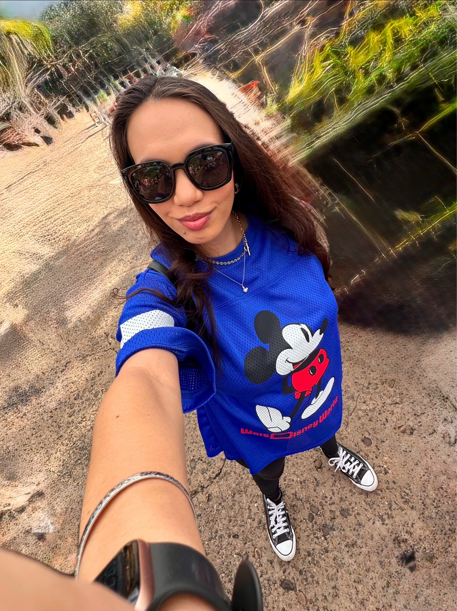 My goal has always been to feel comfortable at the parks, and being pregnant makes it even more essential for enjoying a day out. To achieve this, I wore my Mickey football jersey from the Disney Store, my favorite Converse shoes, and the fleece maternity leggings I love during this pregnancy. I also packed a jacket for when it gets cooler at night. I also linked my go-to makeup and jewelry accessories to help recreate this look.

#LTKBump #LTKBaby #LTKBeauty