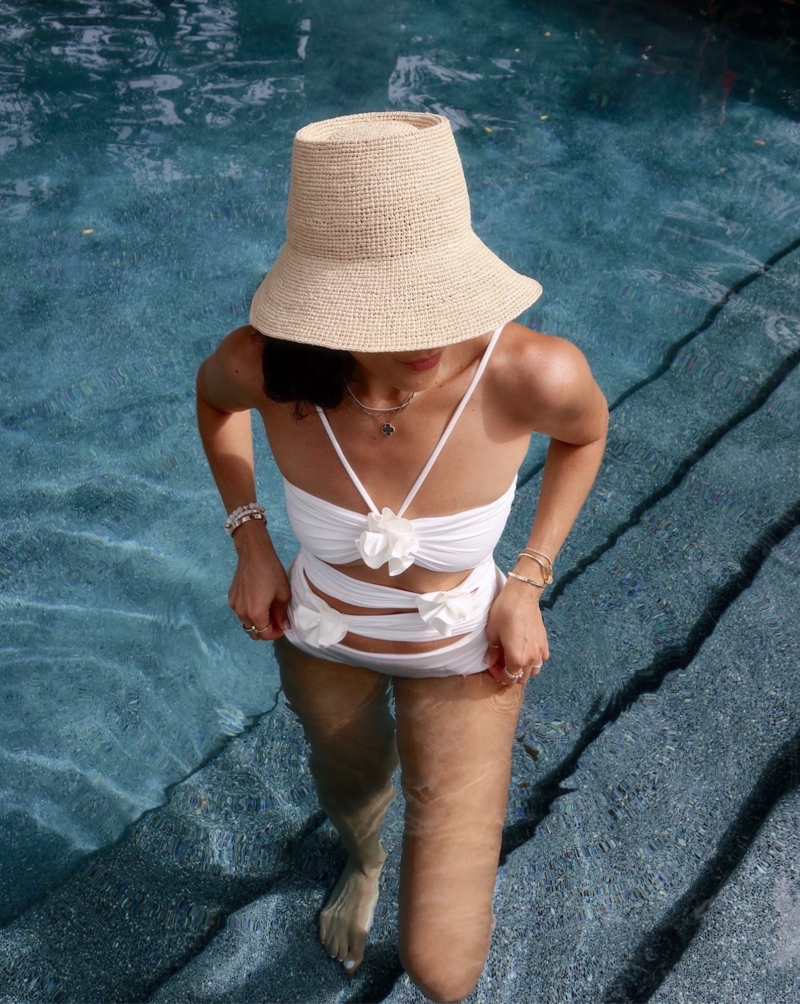 One of my favorite white one piece, could also be used as a top with coverup pants for resort style! 

#LTKSeasonal #LTKOver40