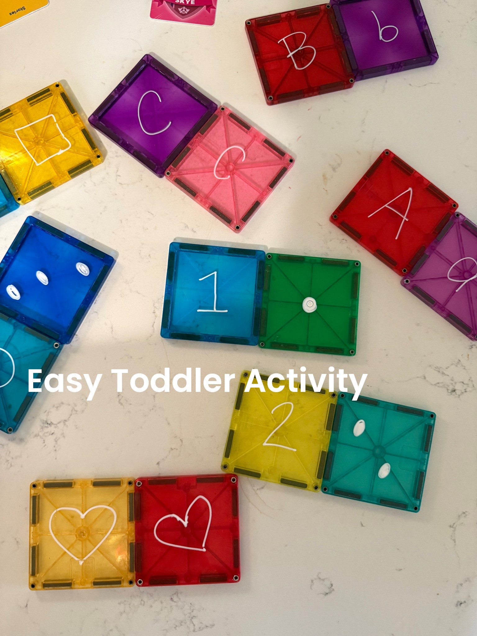 East toddler activity and all you need is a chalk pen and magnatiles. You can make it as easy as it is difficult as you want. We like to draw shaped numbers letters whatever we’re learning that week. Draw two matching items on two different magnet tiles mix them around and let your child find their match. You can also make it a puzzle super easily by drawing half on one tile and half on another and mixing it around. Fun and easy! 

#LTKFamily #LTKKids
