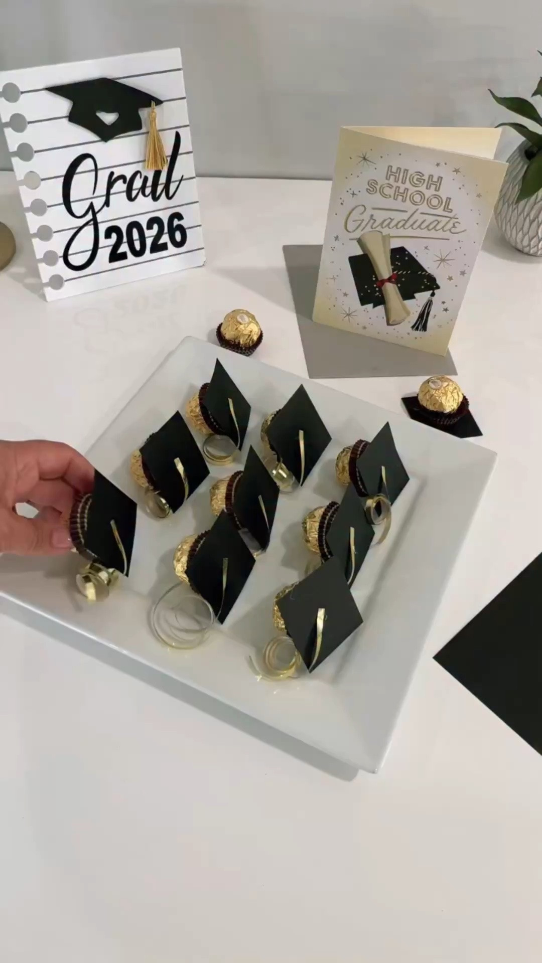 @cvspharmacy 
Graduation season is here 🎓 and I found the cutest way to build a thoughtful grad gift with CVS! I picked out a graduation card, some Ferrero Rocher chocolates, and turned them into this fun DIY grad cap gift idea ✨ It’s simple, affordable, and feels so personal. Perfect for celebrating your graduate and making their big day even sweeter 💙

https://creators.cvs.com/mypage/DGC/collections/25544

#CVSPartner #CVSGifting #GradGifts