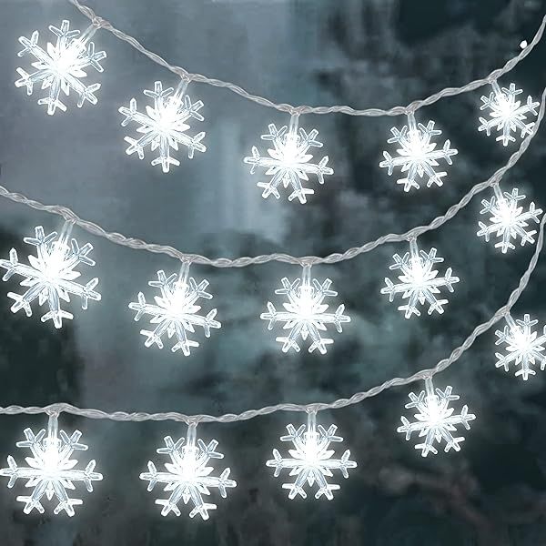 100 LED Christmas Snowflake Lights, 32ft Snowflake Fairy String Lights Indoor, 8 Modes Plug in Ch... | Amazon (US)