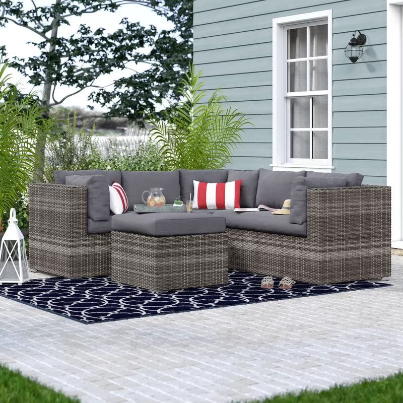 Jarrot 4 Piece Rattan Sectional Seating Group with Cushions | Wayfair North America