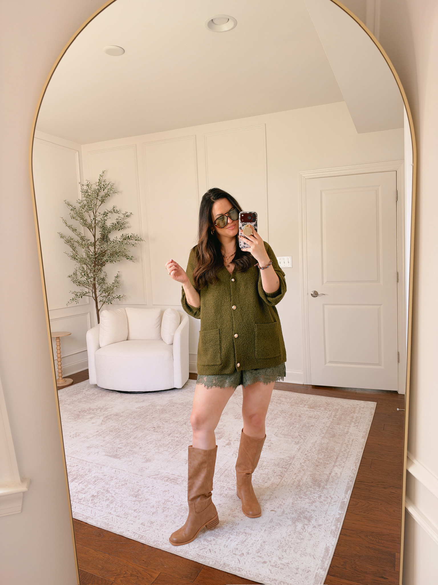 Wearing a large in the cardigan and an XL in the shorts 

 #LTKSeasonal #LTKMidsize