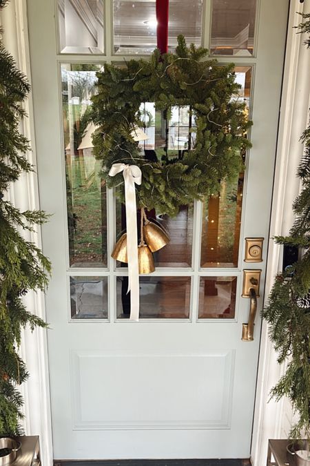 Holiday front door! Wreath, bells, ribbon, and garland! 

#LTKHoliday #LTKhome