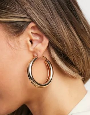 ASOS DESIGN 40mm hoop earrings in thick tube in gold tone | ASOS (Global)