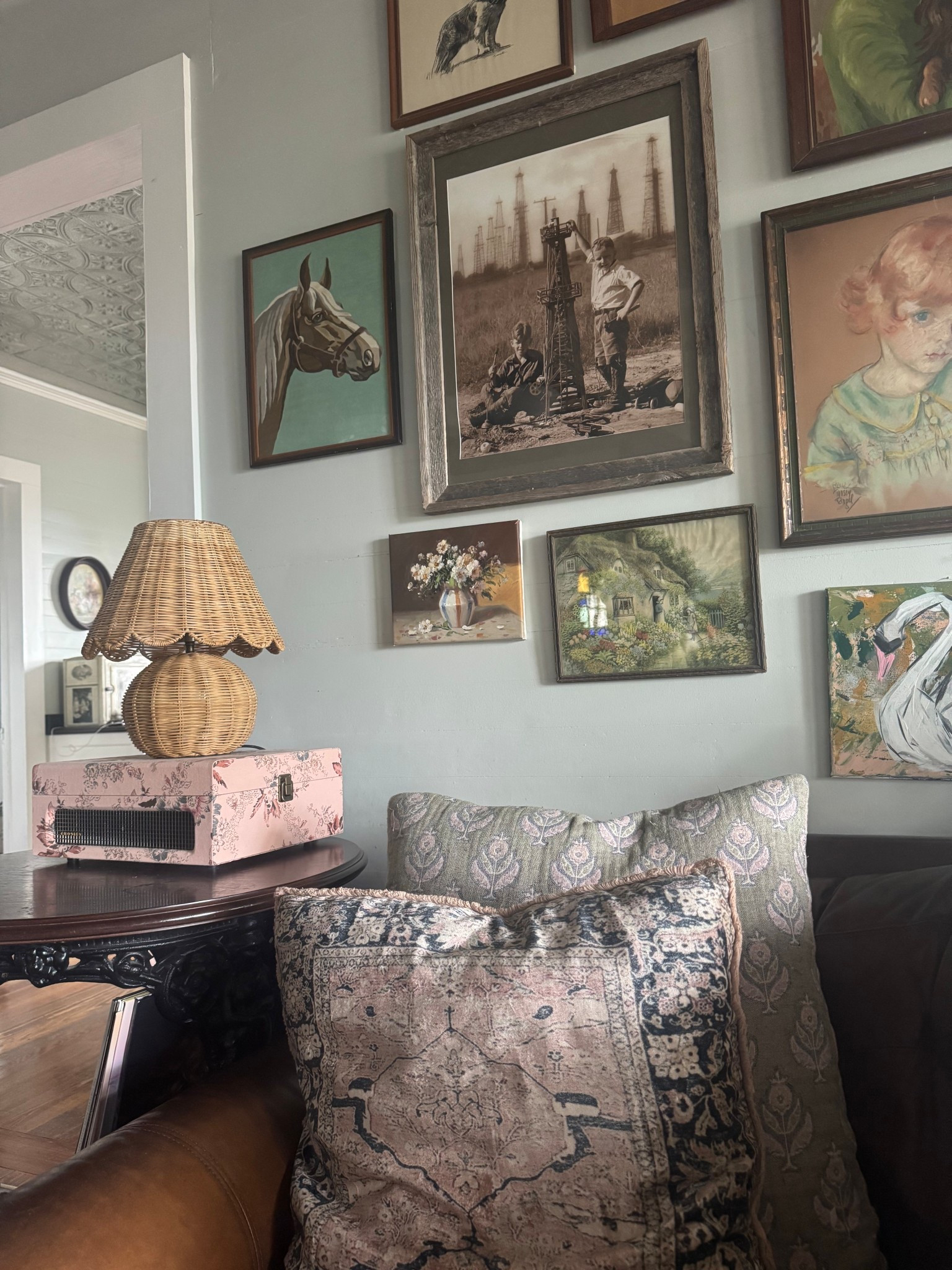 Loving Lately: I recently thrifted this vintage horse paint by number for $5. I then restyled my side table to include my beautiful record player and wicker lamp, and I love this whole cozy scene in my living room. The gallery wall is still a work in progress, but I love that the majority of the pieces were thrifted and collected over time. What do you think?

Shop some of the scene here: 

#LTKSeasonal #LTKHome