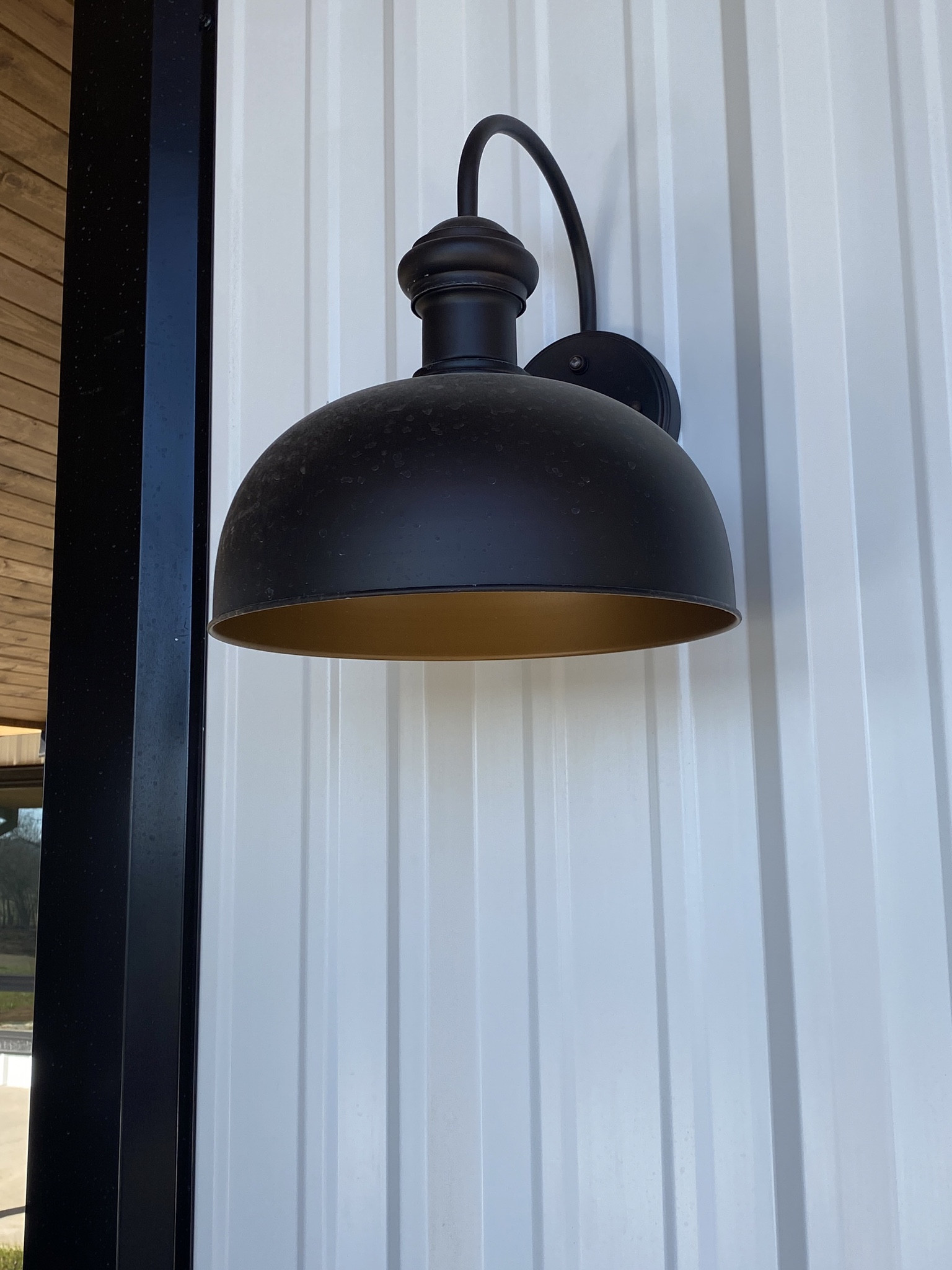 These are our beautiful steel exterior barn lights placed at each door and around our barndominium. Love that they are dusk to dawn lights; they automatically come on at sun down and turn themselves off when the sun comes up. 

#LTKhome