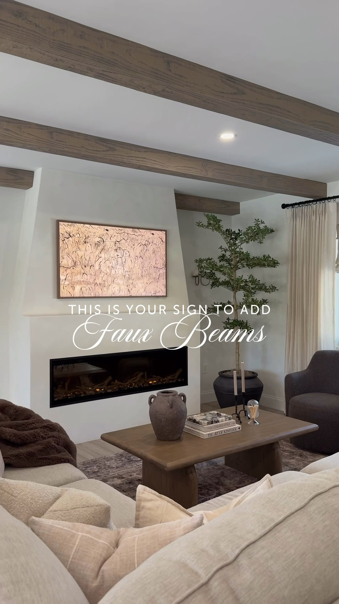 Faux wood beams from Amazon 🤎  These beams are so easy to install & look so realistic and custom. The best part? We  didn't have to custom build them or weigh down the roof with heavy wood.

The details:
Color: sandstone
Ceilings: 8ft
Size: 5.5 x 5.5
How many we used: 5

#amazonhomefinds #amazonhome #fauxwoodbeams #diy #homedepot #livingroom #homedecor
#bedroomtransformation #fauxbeams

#LTKStyleTip #LTKHome #LTKSeasonal