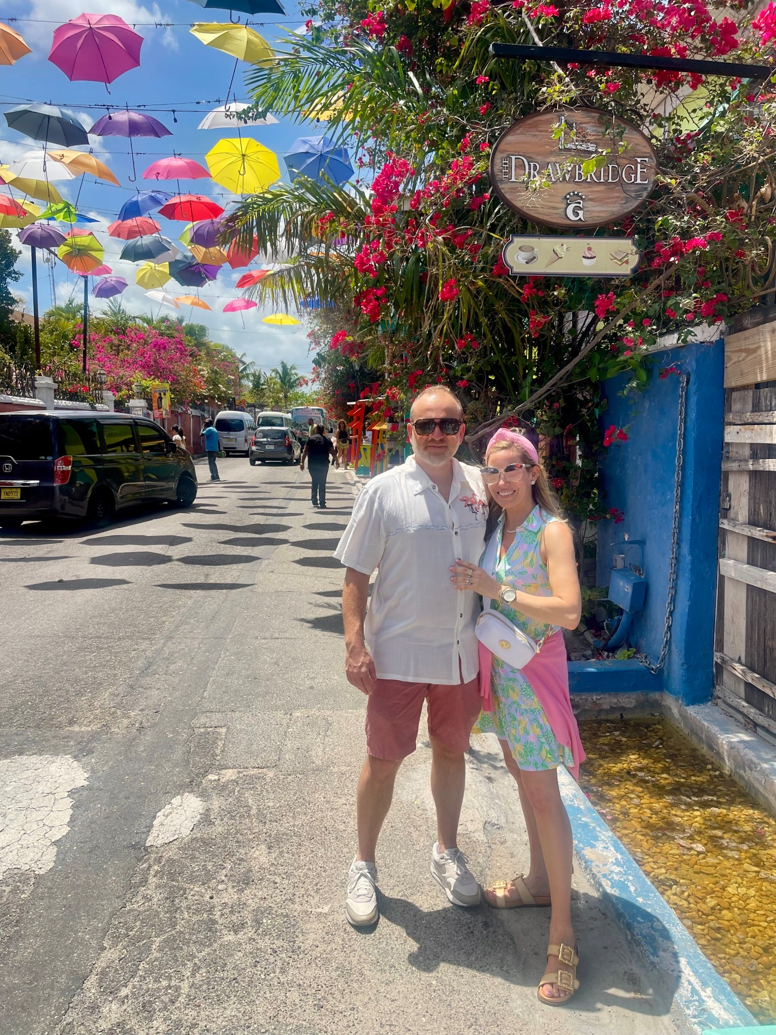Code ASHLEYBA for 10% off my Melinda Maria jewelry ✨

Strolling the vibrant streets of Nassau under a sky full of umbrellas ☂️🌈 in the Lilly Pulitzer Riegan Dress — a must-pack piece for tropical vacations! This sleeveless cotton poplin dress is lightweight, breathable, and full of color 🌴👗. I paired it with a pink cardigan tied at the waist and my go-to gold buckle sandals for easy exploring ☀️🌺👡.

My accessories are doing all the work — a white crossbody bag for hands-free comfort, pink headband for a playful pop, and Melinda Maria pearl jewelry for that extra sparkle 💞💎 (use code ASHLEYBA for 10% off!).

Outfit Details:
	•	Dress: Lilly Pulitzer Riegan (size XS) 🌸
	•	Cardigan: lightweight & easy to tie on the go 🧁
	•	Bag: compact white crossbody 🤍
	•	Shoes: comfy gold buckle slides 👡✨
	•	Jewelry: Melinda Maria (pearl pieces linked on LTK!) 💫


Lilly Pulitzer Riegan dress, Nassau cruise outfit, colorful vacation look, tropical travel fashion, spring break outfit, pink and green dress, comfy walking outfit

Perfect for:
Cruise port days 🚢, colorful city strolls 🌈, tropical lunch dates 🥗, spring or summer travel 📸

Bring on the island vibes & bold prints — this look was made for sunshine, smiles, and exploring new places! 🧳🌞🛍️
Everything is linked now on LTK!

#LTKOver40 #LTKFindsUnder100 #LTKFindsUnder50