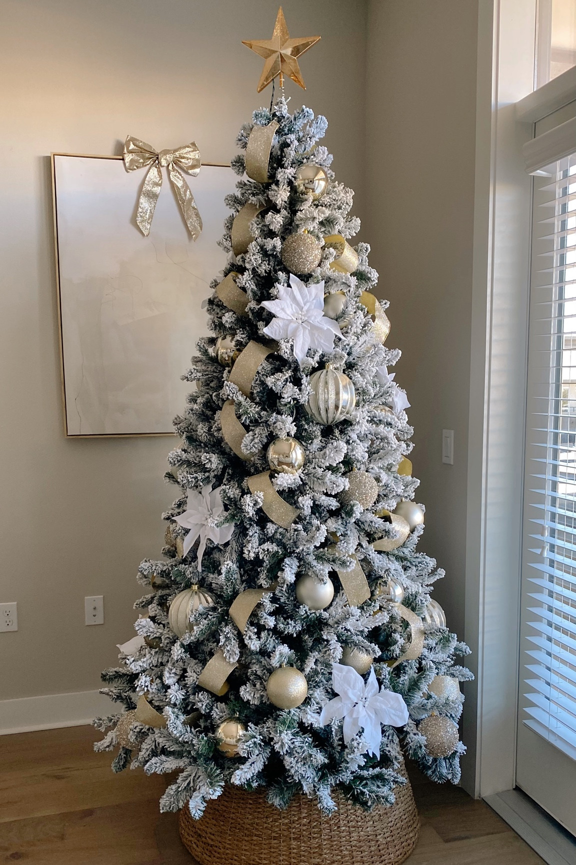 Christmas tree details 
Tree is from Home Depot (7.5 ft)
Ornaments & ribbon from Target 
White poinsettia from Michaels

#LTKstyletip #LTKSeasonal #LTKHoliday