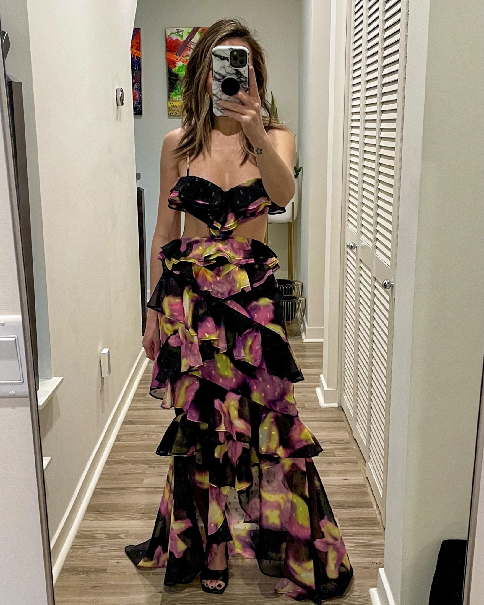 Wedding guest dress 🌺 Love this cutout dress! It’s so flattering on and the print is gorgeous. Think wedding guest dress, resort wear, vacation and date night. 

Wedding guest dress, cutout dress, floral dress, resort wear, vacation outfit, black dress, maxi dress, ruffle dress, The Stylizt 

#LTKStyleTip #LTKParties #LTKWedding